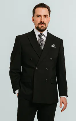 Svart dubbelknäppt kostymkavaj med spetsiga slag