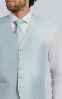Puderblå väst i polyester dupion