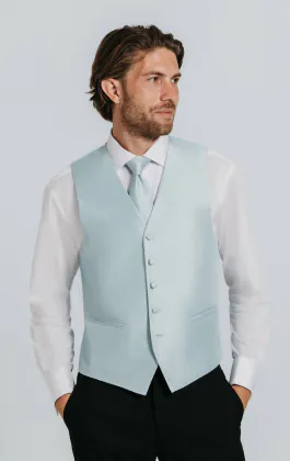 Puderblå väst i polyester dupion